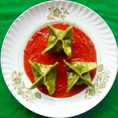 A picture of Paneer stuffed spinach momos.