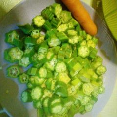 A picture of Okra(mabenda) and fried fish.