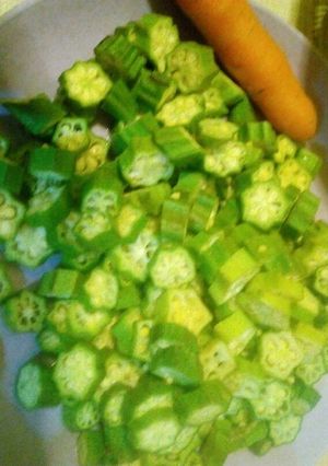 A picture of Okra(mabenda) and fried fish.