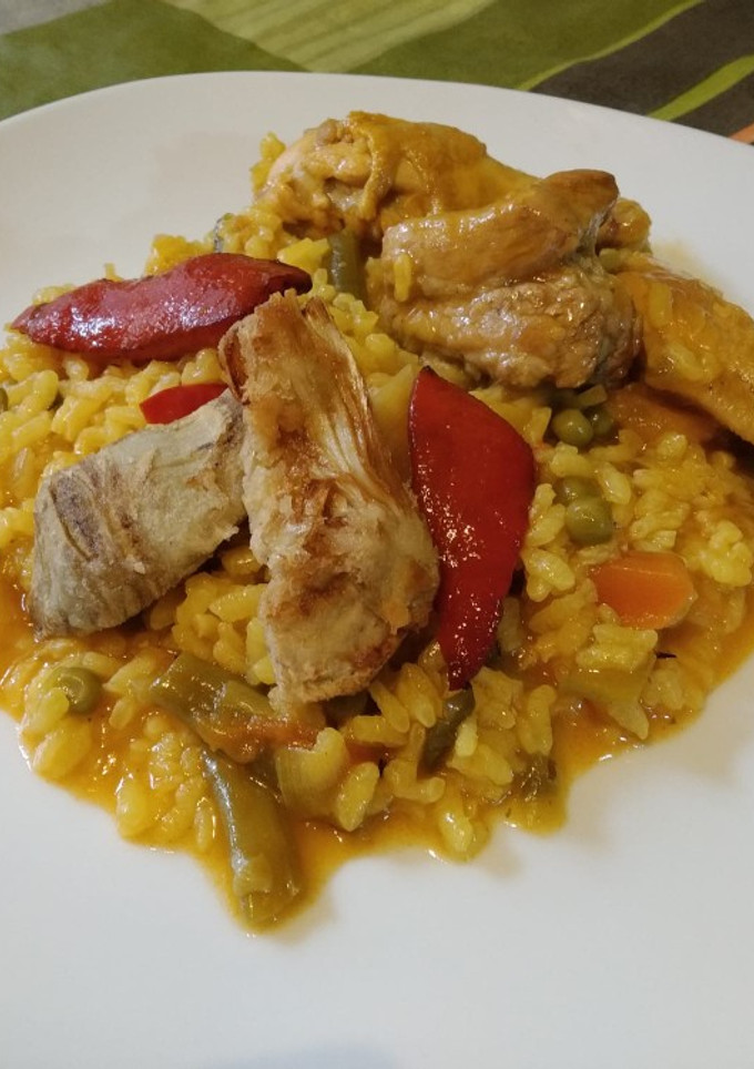 Una foto de Arroz meloso con pollo, costilla de cerdo y verduras