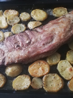 Una foto de Costillar al tomillo y vino blanco