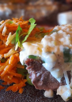 Una foto de Marucha al verdeo gratinada con zanahoria, apio y parmesano