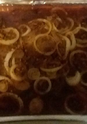 A picture of Steak and onions.