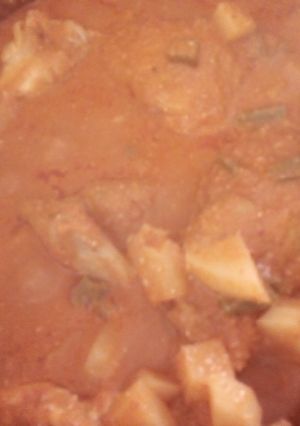 Una foto de Pipian rojo de ajonjolí con pollo