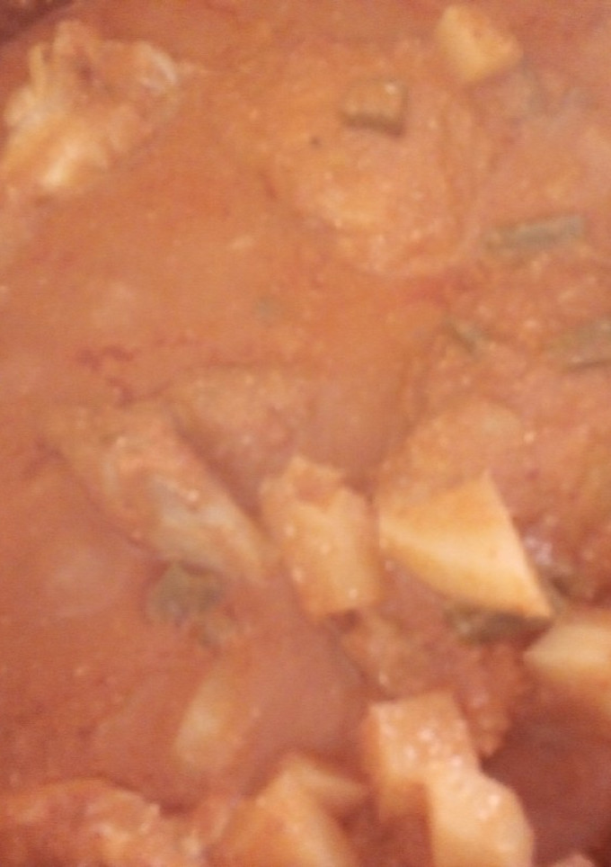 Una foto de Pipian rojo de ajonjolí con pollo