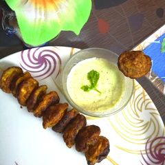 Veggie Oats Egg fritters With coriander and lemon chutney A picture of Veggie Oats Egg fritters With coriander and lemon chutney.