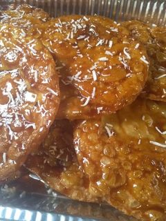 Una foto de Buñuelos con caramelo y coco