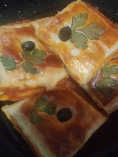 صورة لوصفة بيتزا كوكا (Pizza couvert)