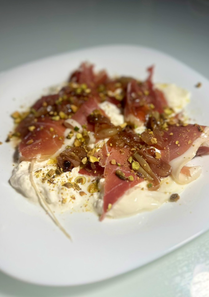 Una foto de Ensalada de uvas asadas