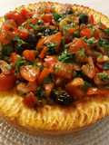 Quiche gateau di patate con tonno capperi pomodori e acciughe