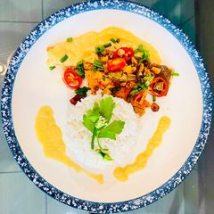 A picture of Grilled Chilli Salmon with Corn Sauce and Rice.