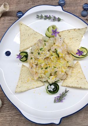 Foto di Tartare di orata con sedano e bottarga