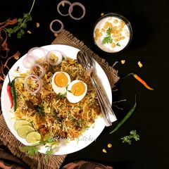 A picture of Hyderabadi Kachchi Mutton Dum Biryani.