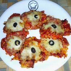 A picture of Spicy cheesy baked potatoes.