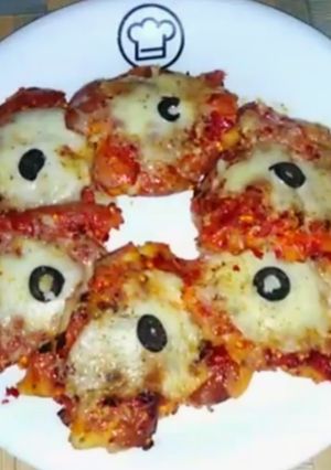 A picture of Spicy cheesy baked potatoes.