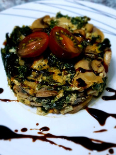 Una foto de Revuelto de Kale y Champiñón