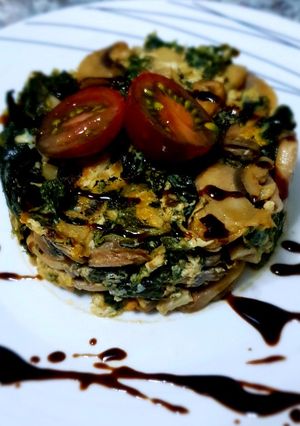 Una foto de Revuelto de Kale y Champiñón