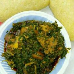 A picture of Afang soup and eba.