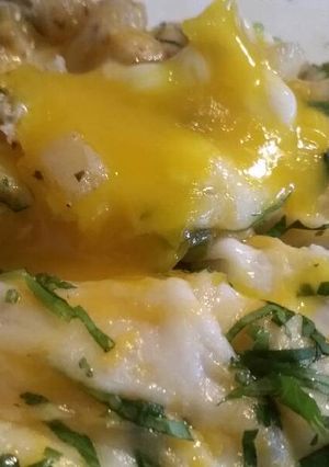 A picture of Potato Skillet w/ Baked Eggs.