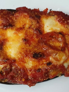 Una foto de Berenjena al horno con tomate y mozzarella