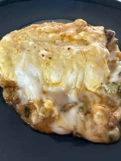 Una foto de Lasaña de pollo al curry y queso