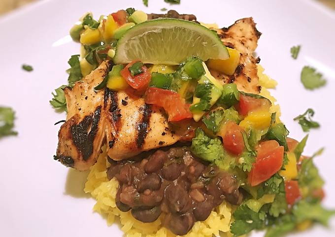 Island chicken with beer braised black beans and yellow rice