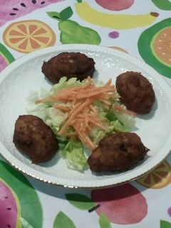 Una foto de Buñuelos de merluza con verduras
