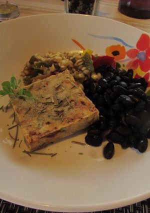 Una foto de Filete de Merluza al horno con granos