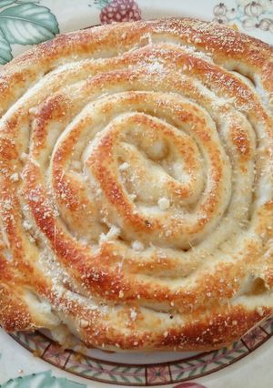 A picture of Cheese and tomato spiral.