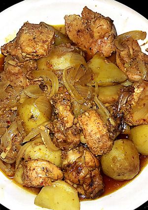 A picture of Potato fried chicken curry.