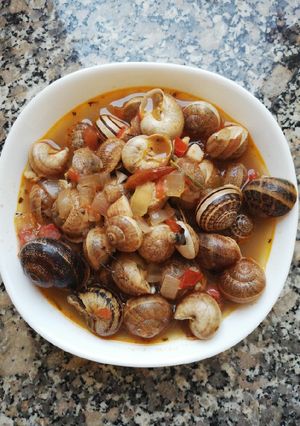 Una foto de Caracoles en salsa