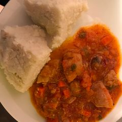 A picture of Ugali and Chicken stew.
