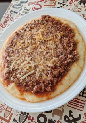 Una foto de Polenta con salsa de carne
