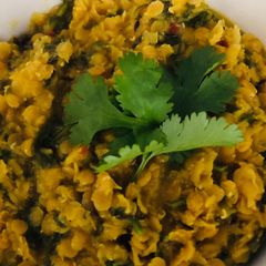 A picture of Carrot top and red lentil dal - vegan.