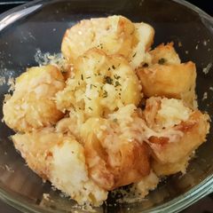 A picture of Parmesan smashed Roast Potatoes.