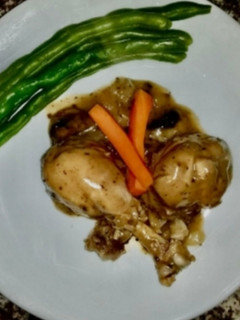 Una foto de Pollo en crema de Champiñones