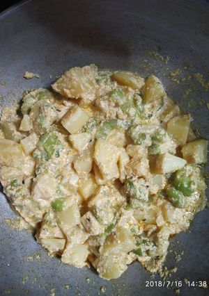 A picture of Poppy seeds curry with potato and ridge gourd.