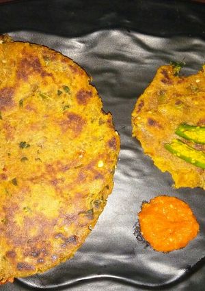 A picture of Winter special Digestive Dhebri with leafy greens.