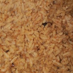 Orange jollof rice A picture of Orange jollof rice.