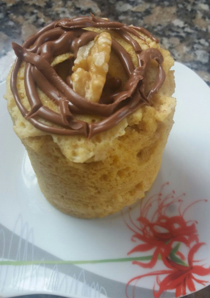 Una foto de Torta de naranja en taza