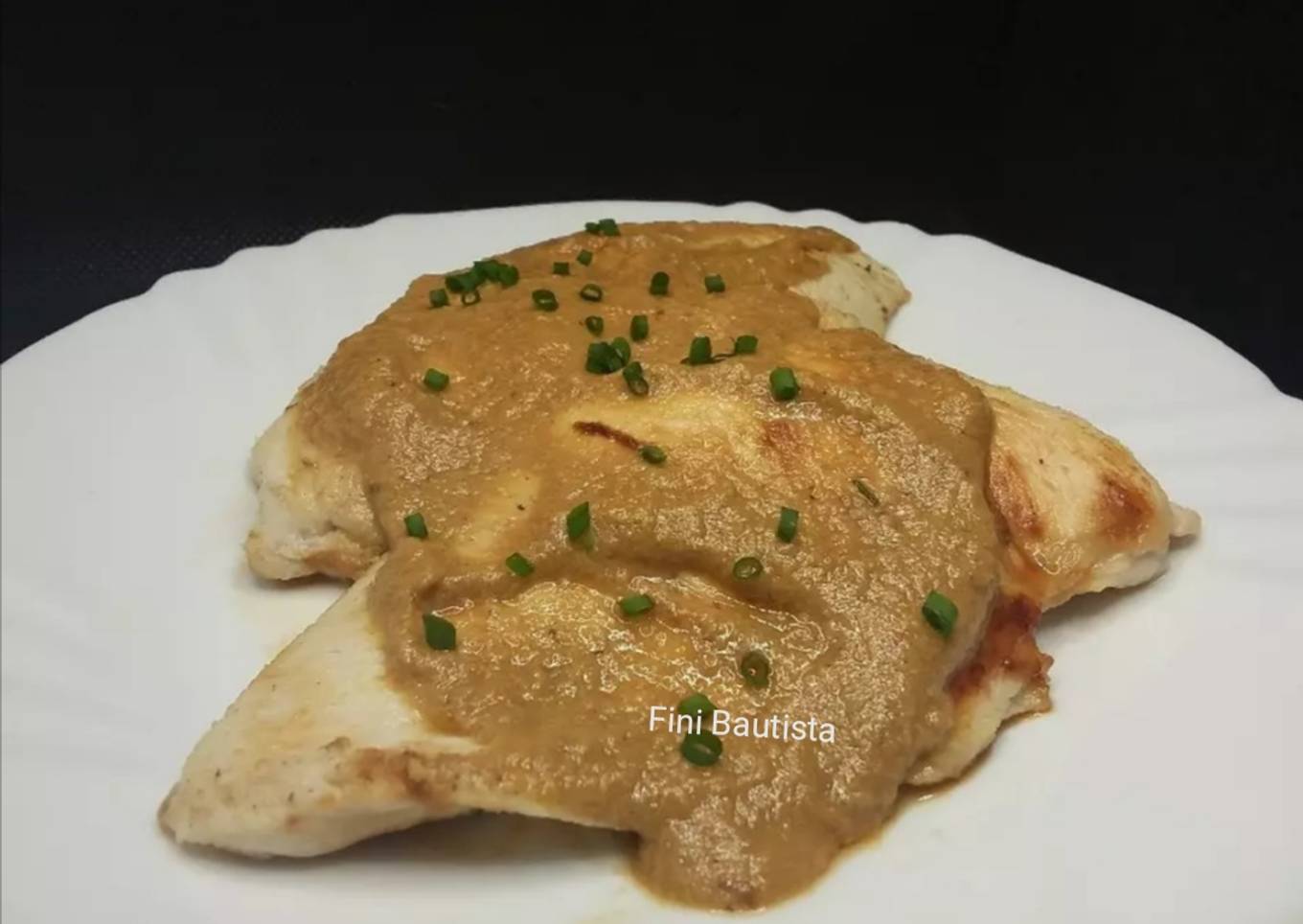 Pechugas con salsa de naranja y leche