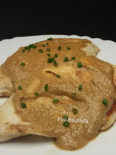 Una foto de Pechugas con salsa de naranja y leche