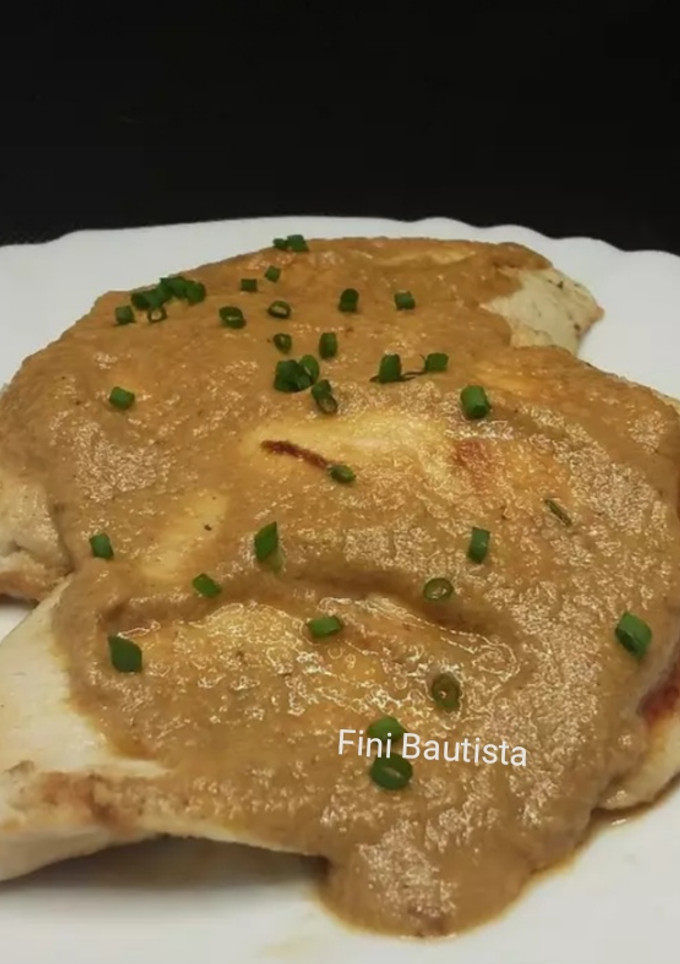 Una foto de Pechugas con salsa de naranja y leche