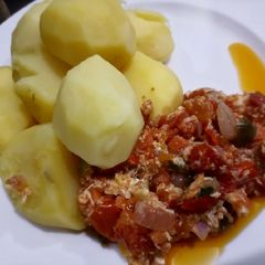 A picture of Boiled Irish potato and egg sauce.