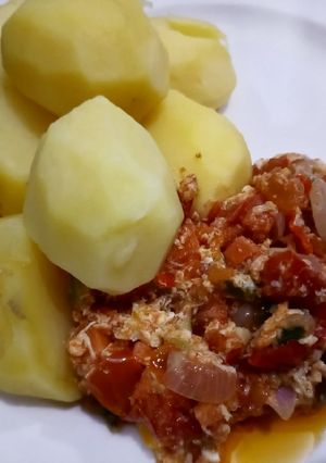 A picture of Boiled Irish potato and egg sauce.