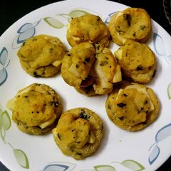 A picture of Baked cheesey potato.