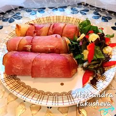 Bacon-wrapped toasted bread rolls A picture of Bacon-wrapped toasted bread rolls.
