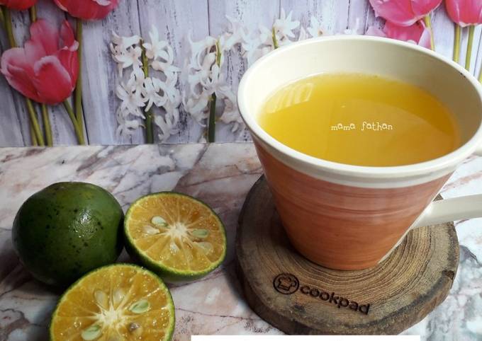 Bagaimana cara bikin Jeruk peras hangat yang spesial