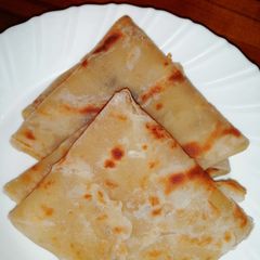 A picture of Soft, layered onion chapati.
