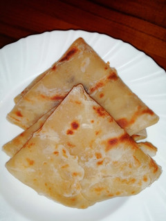 A picture of Soft, layered onion chapati.